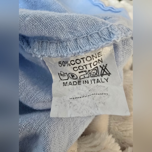 Light Blue Ruffle Hem Top With Button Detail Down The Black - Picture 8 of 10